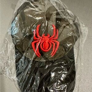 Black Cap with Red Spider Embroidery on Camo background